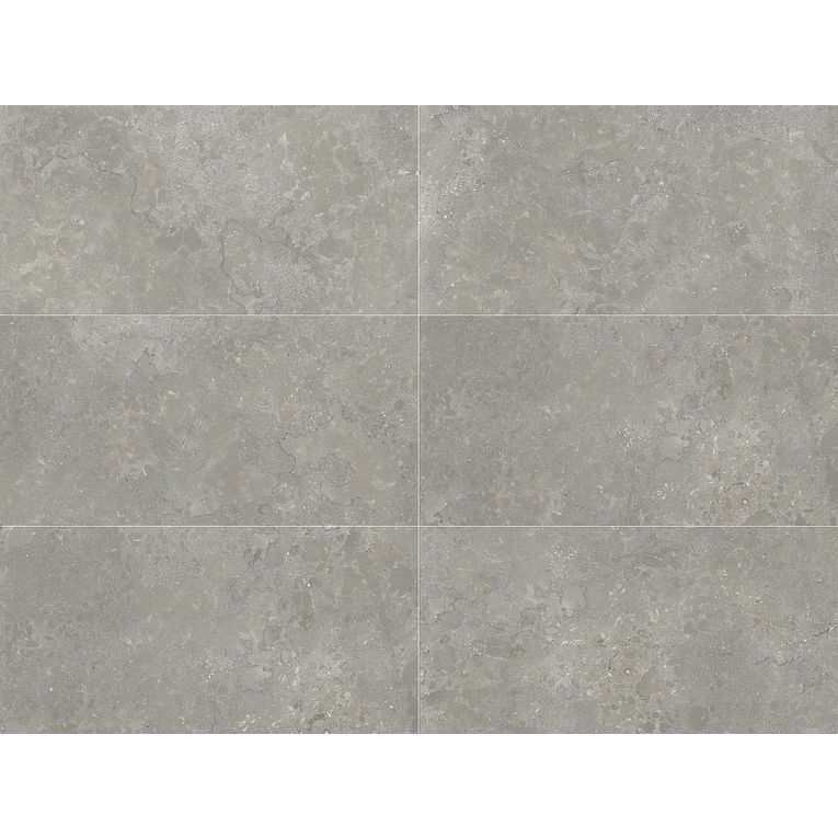 A gray tile floor with some white spots on it