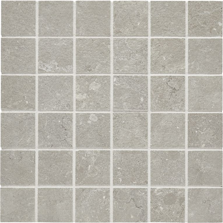 A gray tile floor with white grout.