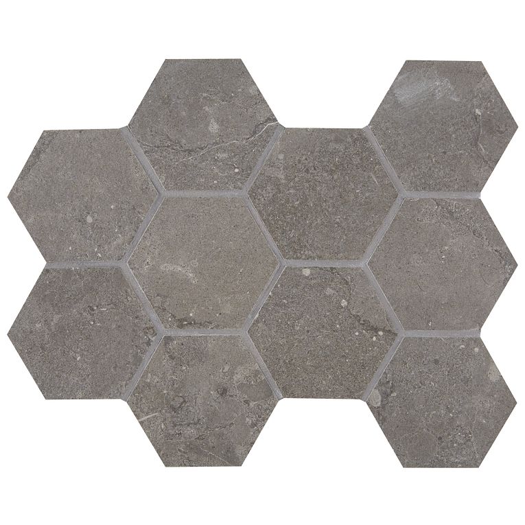 A gray tile floor with hexagonal tiles on it.
