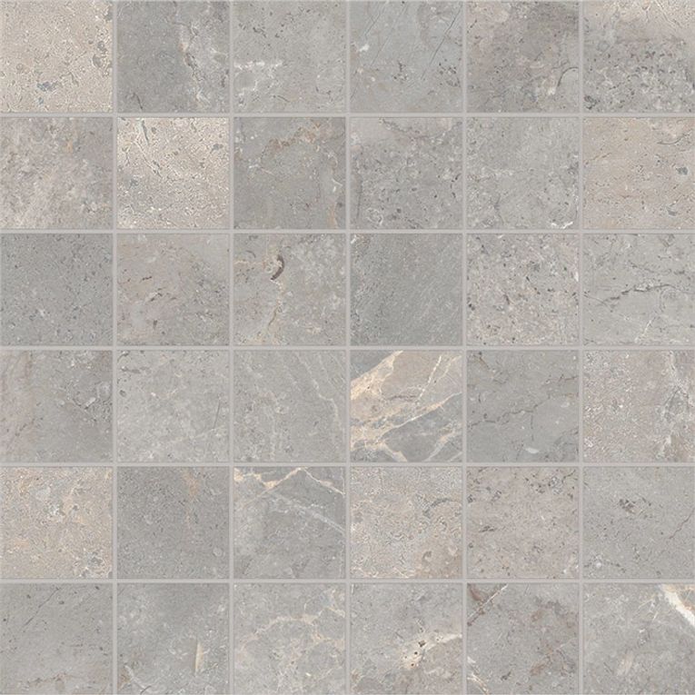 A gray tile floor with some small squares