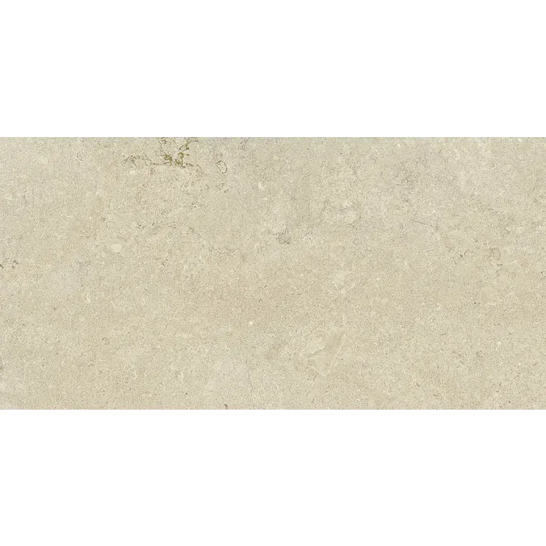 A white tile with some small bubbles on it