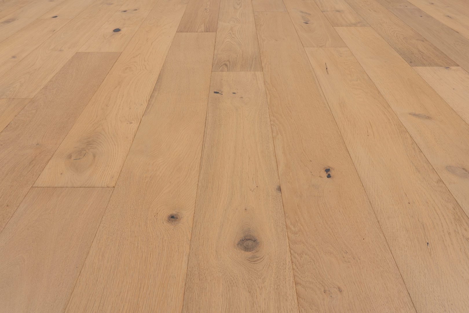 A close up of the wood grain on the floor.