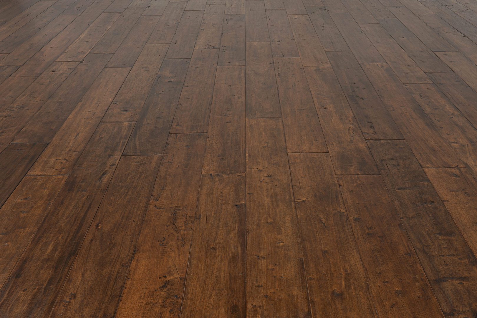 A close up of the floor of an empty room