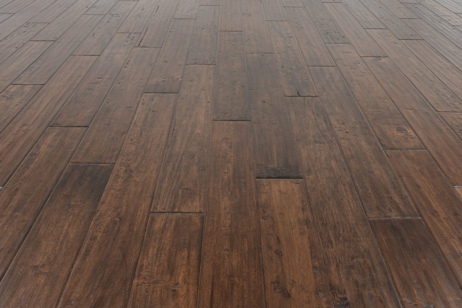 A close up of the floor of an empty room