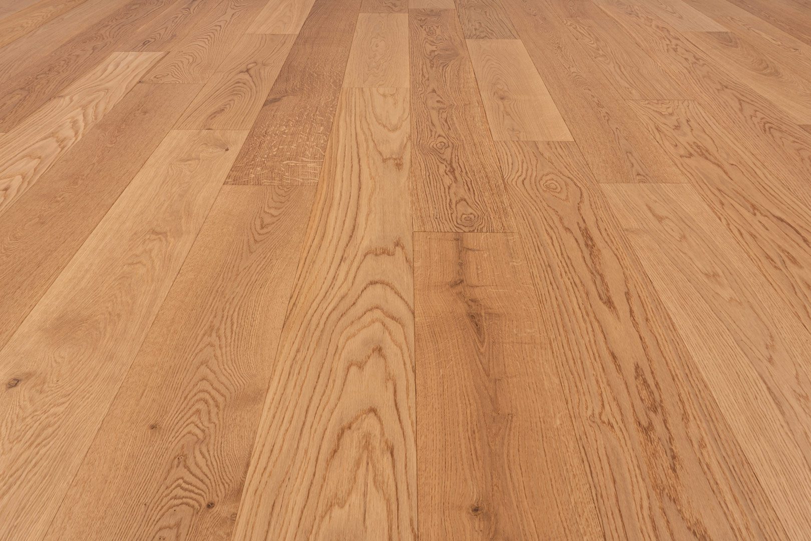 A close up of the wood grain on the floor.