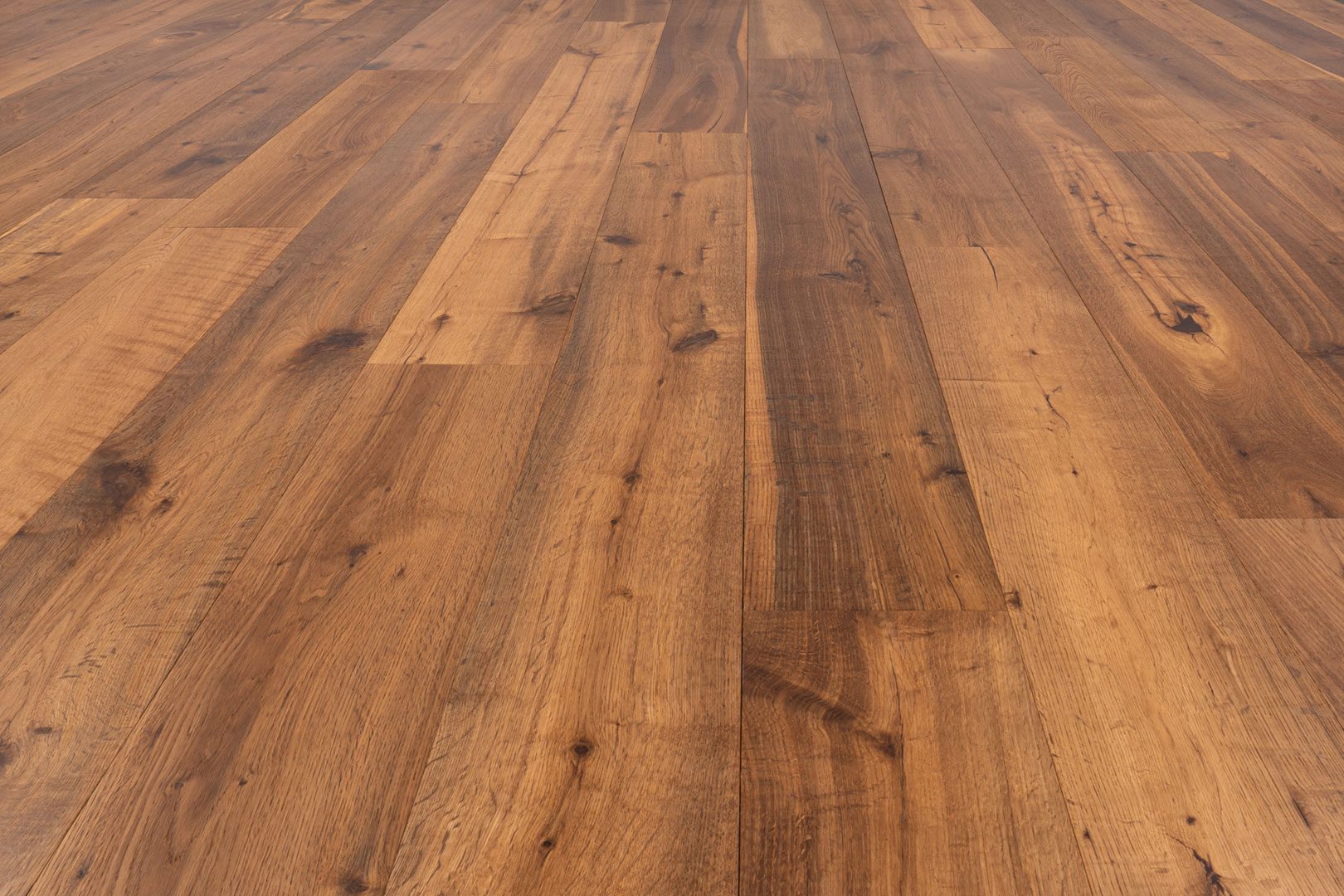 A close up of the wood grain on the floor.