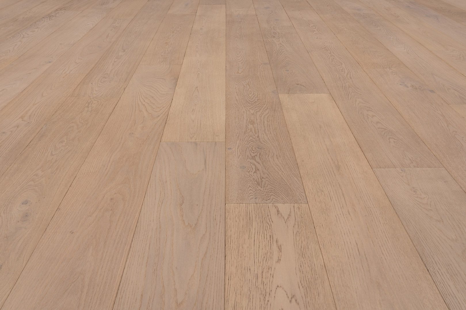 A close up of the wood floor with no one around.