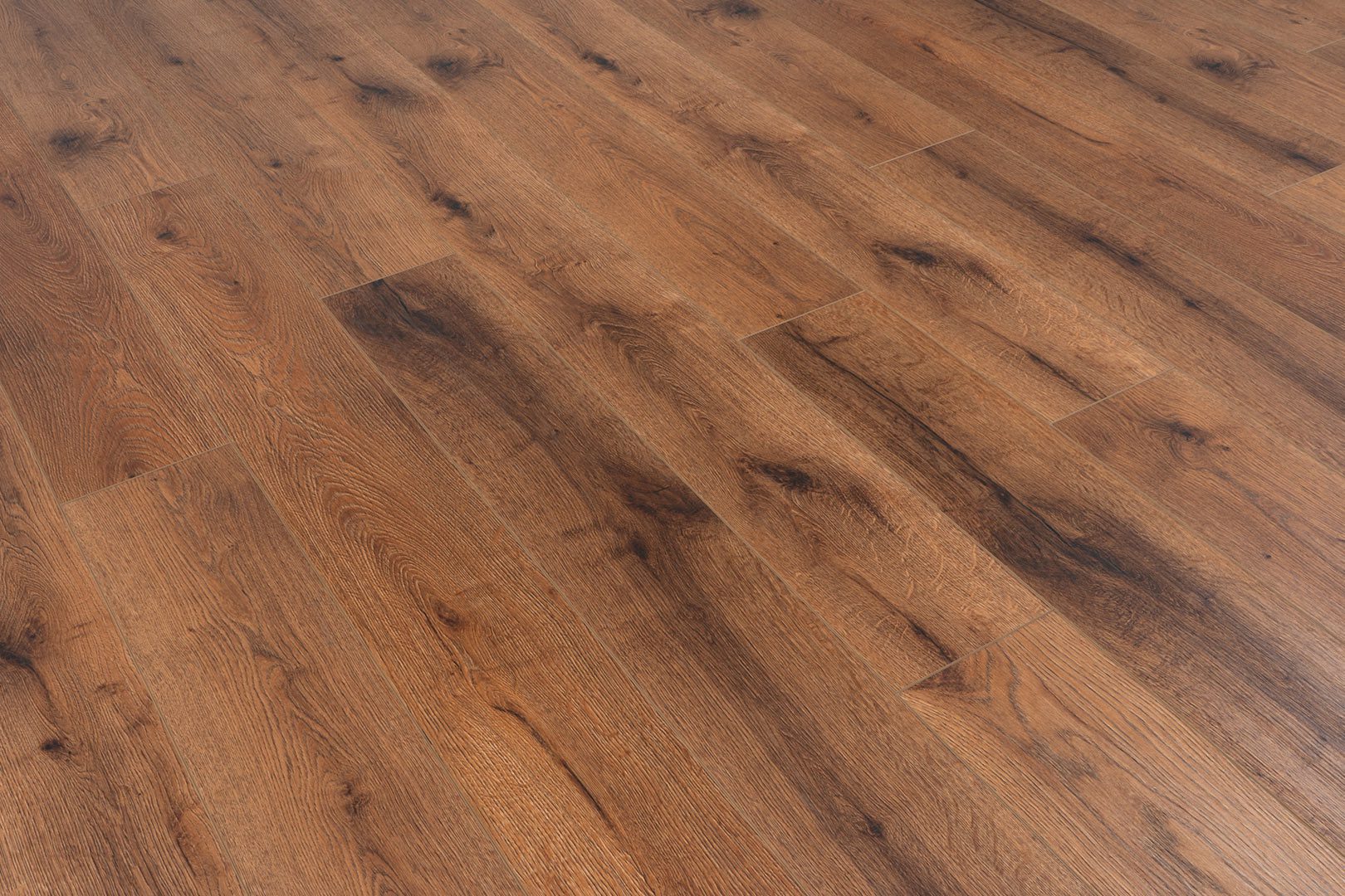A close up of the wood grain on the floor.