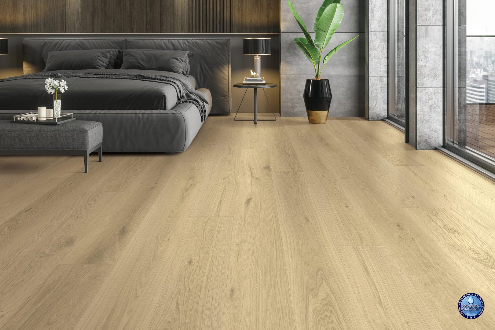 A bedroom with a bed and a plant in the corner.