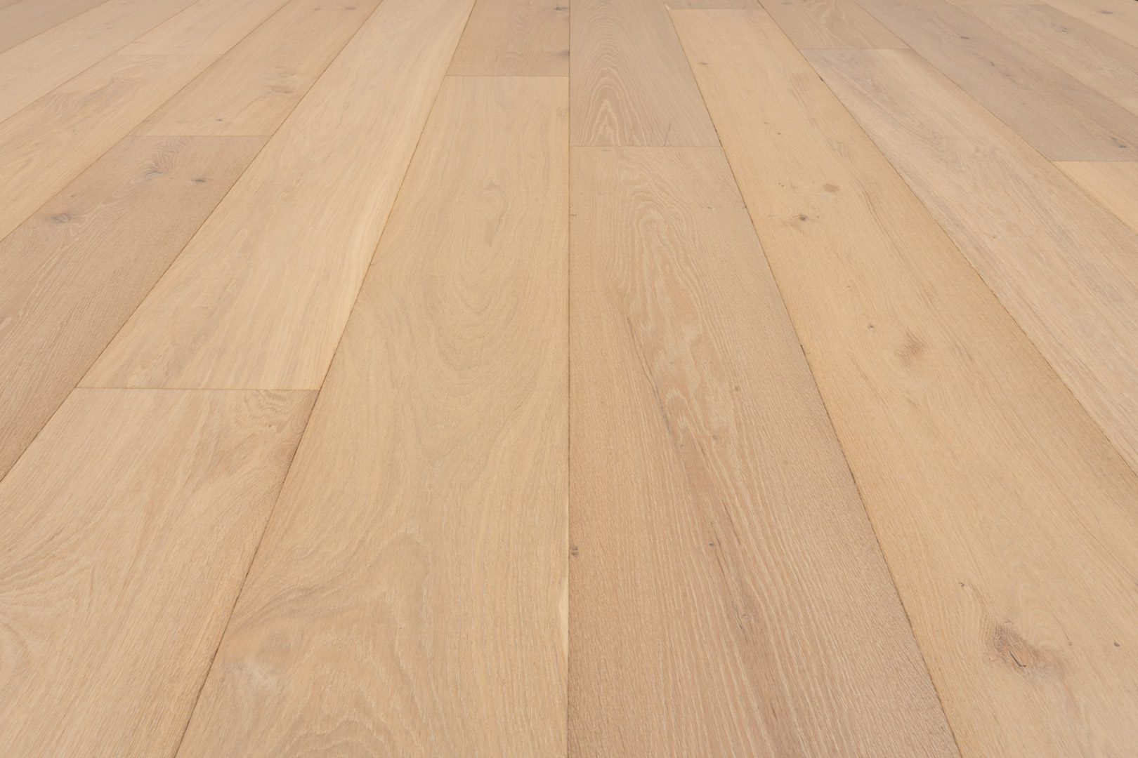 A close up of the wood grain on the floor.