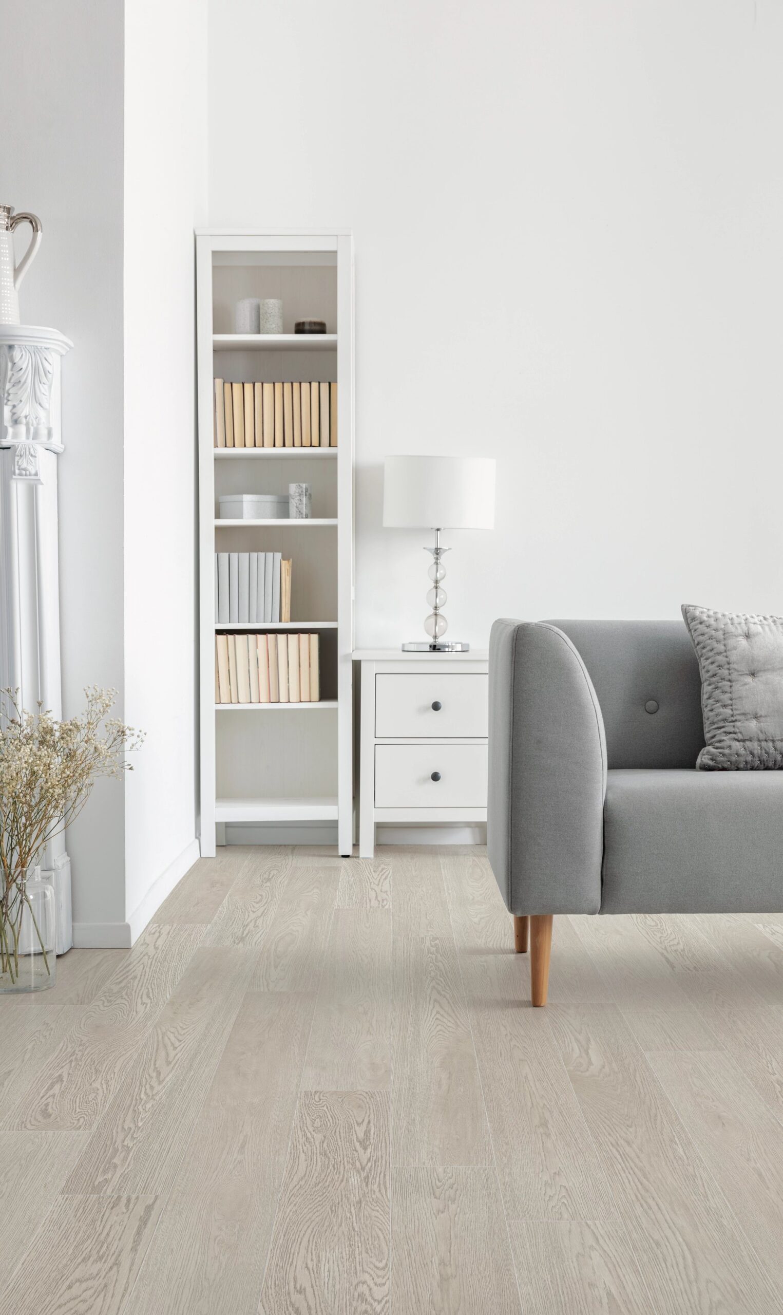 A living room with white walls and furniture.
