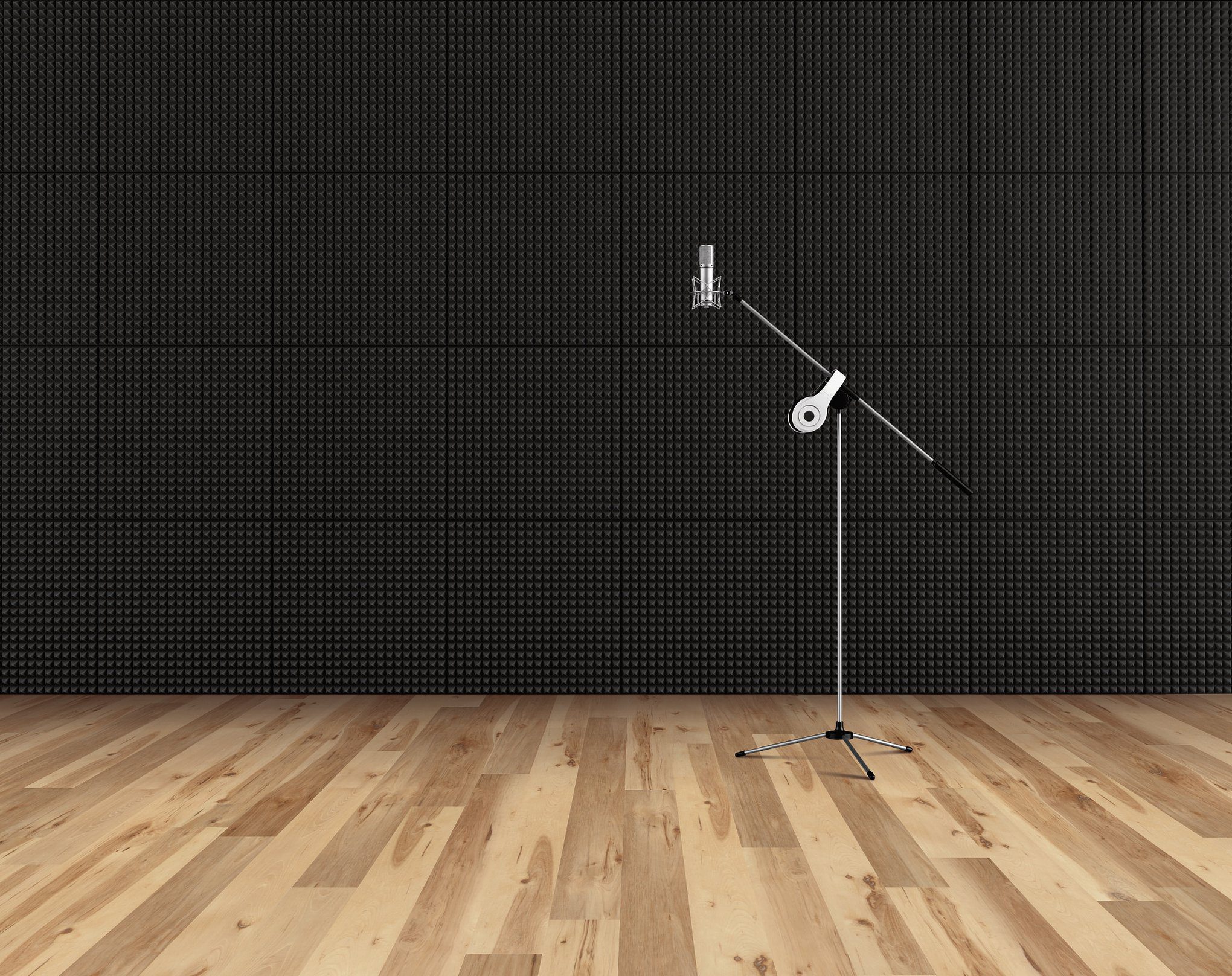 A microphone is on the floor of an empty room.
