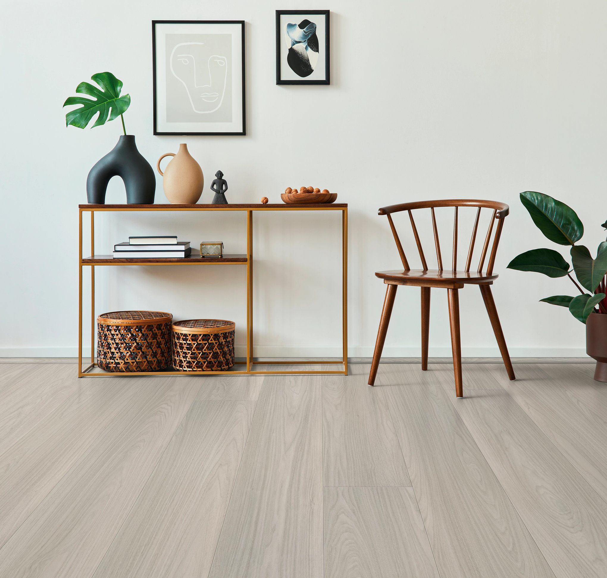 A chair and table in the corner of a room.