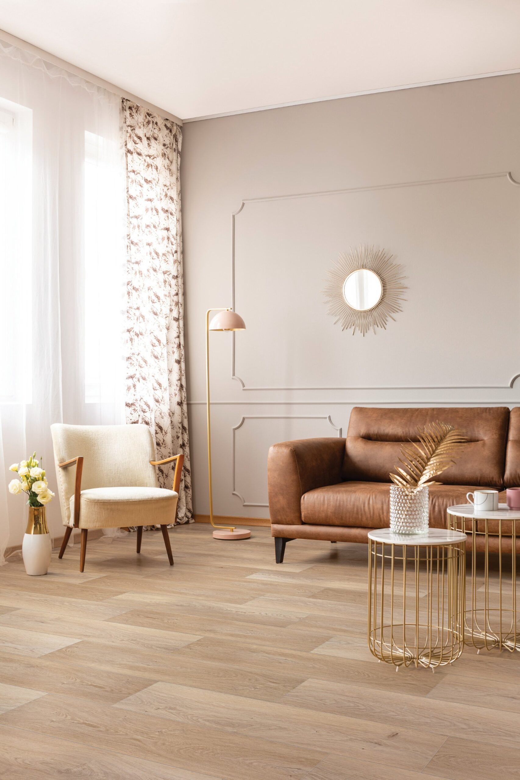 A living room with a couch, chair and table.