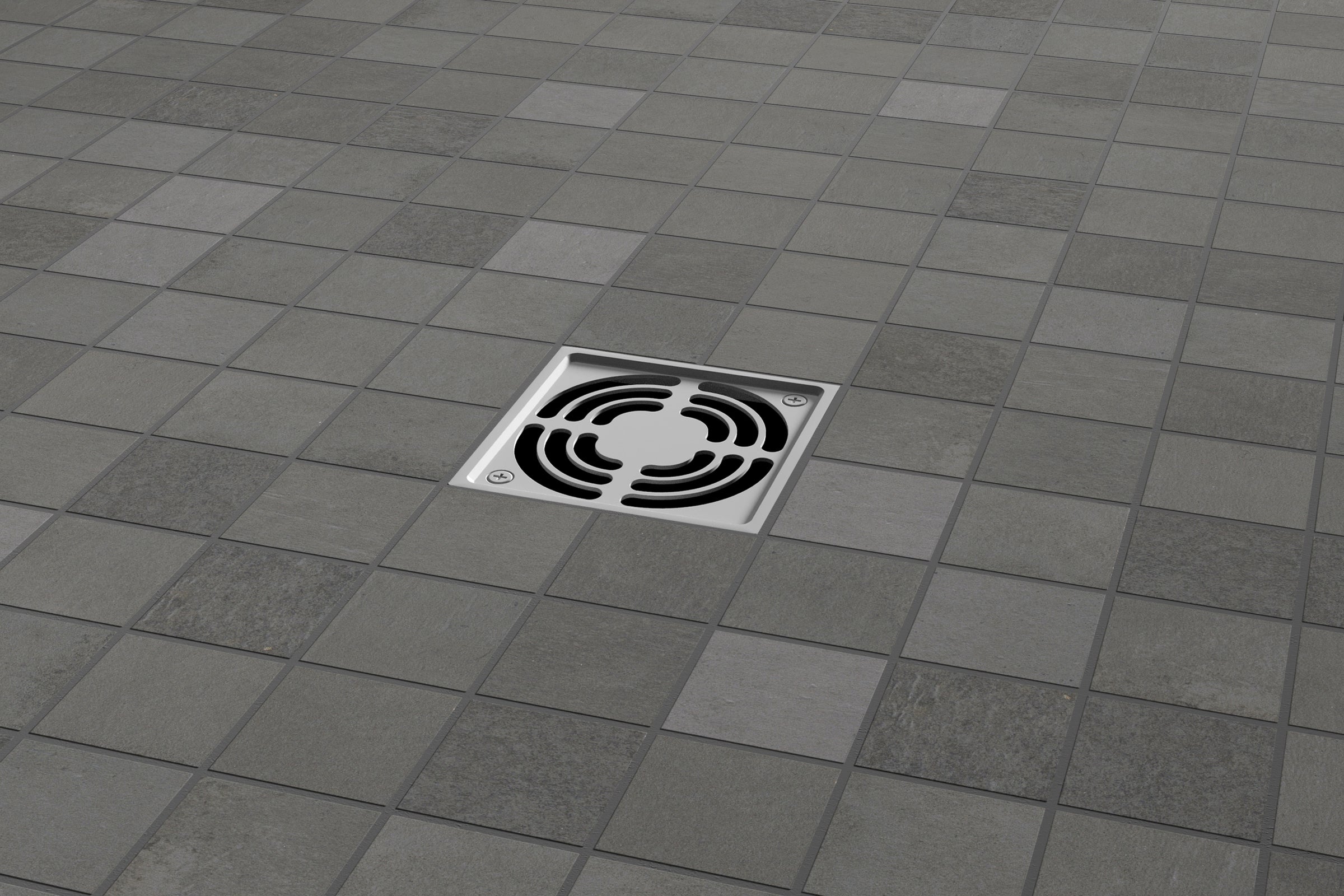 A floor drain with a tile pattern on the ground.