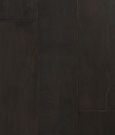 A dark wood floor with some brown lines