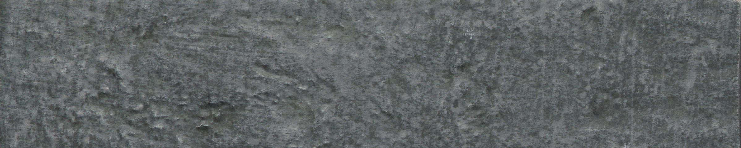 A close up of the ground surface of a stone