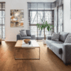 A living room with wooden floors and furniture.