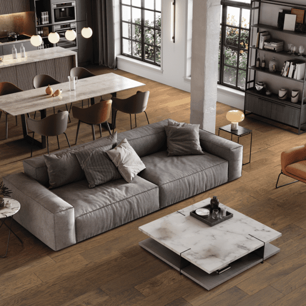 A living room with a couch and chairs
