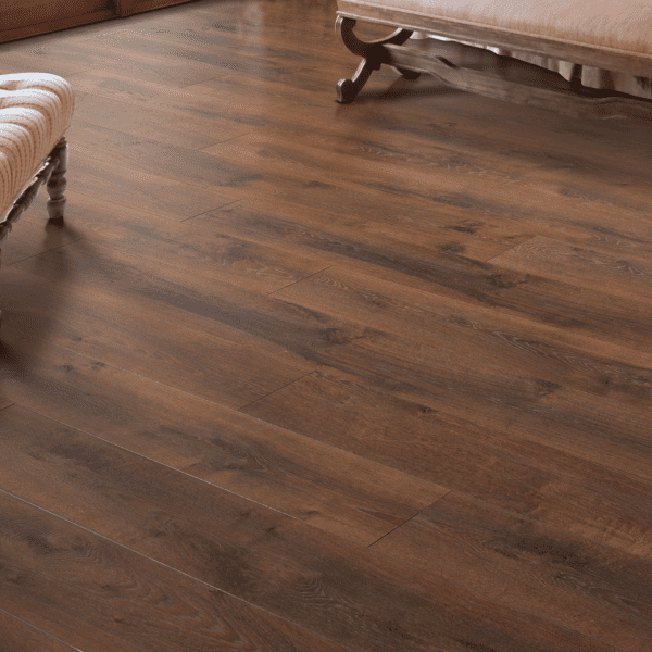 A room with wooden floors and white furniture.