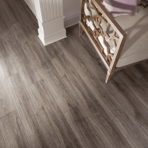 A room with wood floors and a chair.