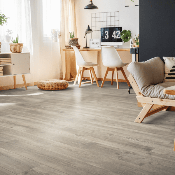A living room with wooden floors and furniture.