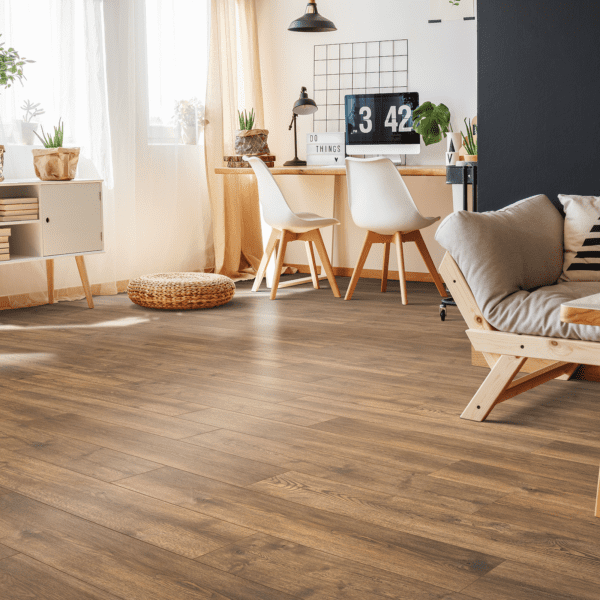 A living room with wooden floors and furniture.