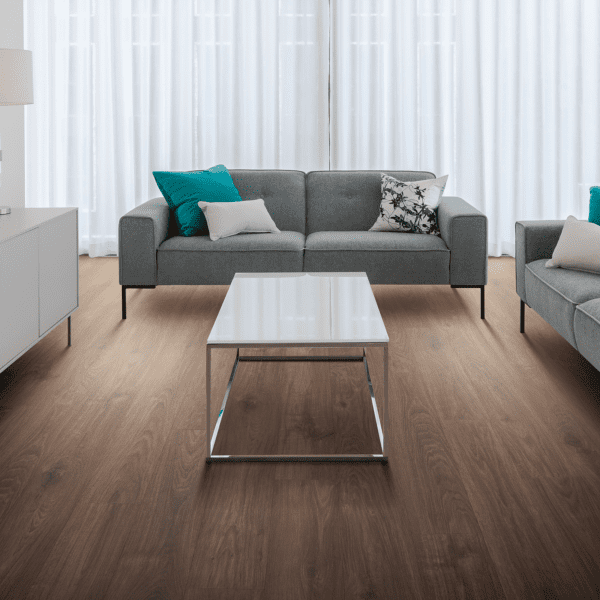 A living room with couches and tables in it