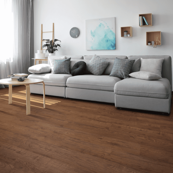 A living room with a couch and table