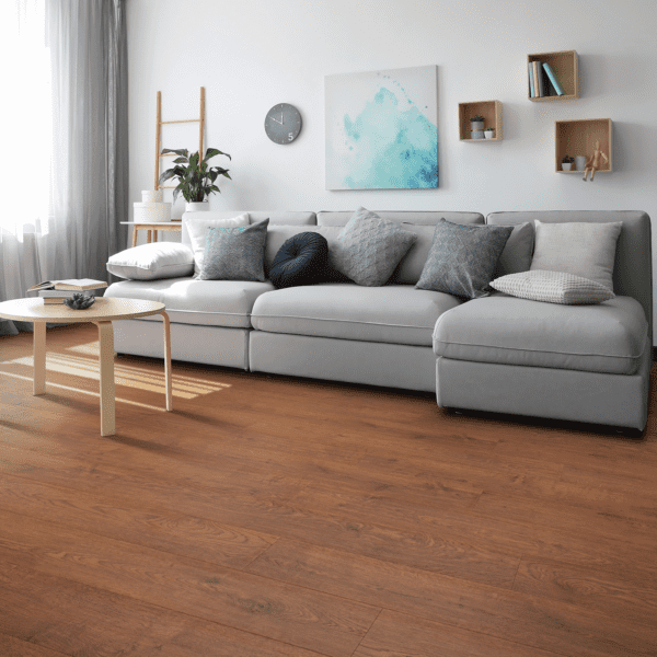 A living room with a couch and table