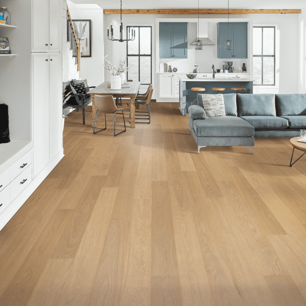 A living room with hard wood floors and furniture.