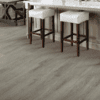 A room with two stools and tables in it