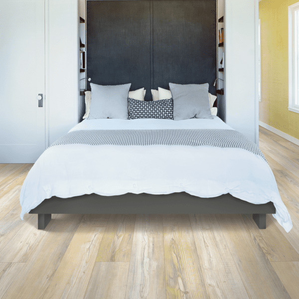 A bed room with a white and black bed
