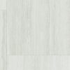 A white tile floor with some type of wood grain.