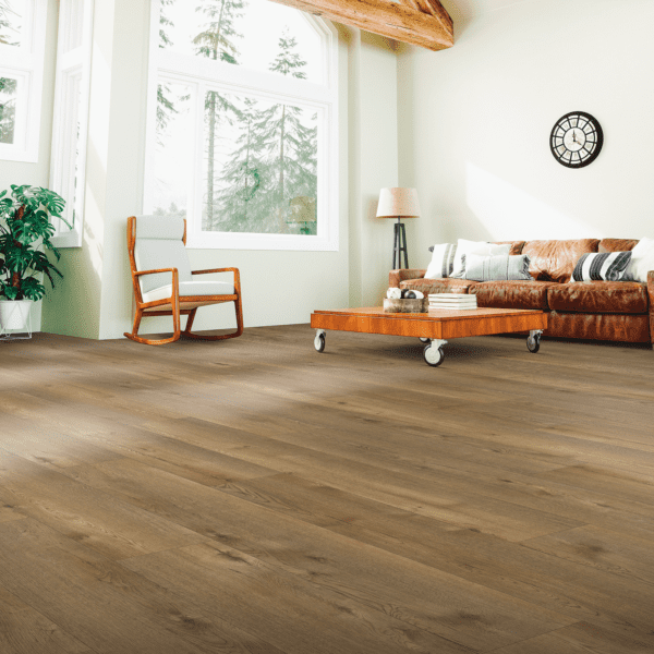 A living room with hard wood floors and furniture.