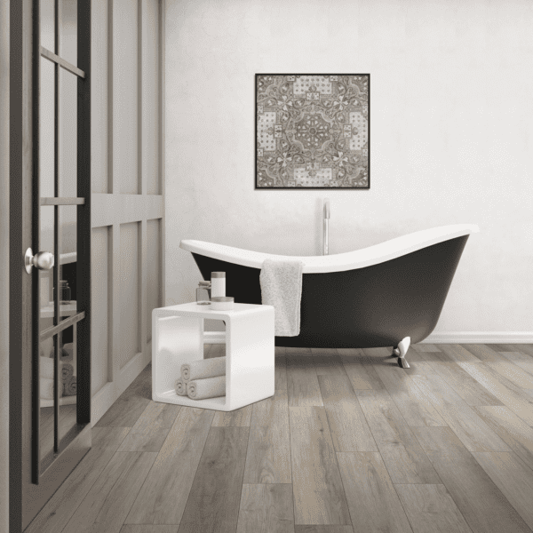 A bathroom with a tub and toilet paper.