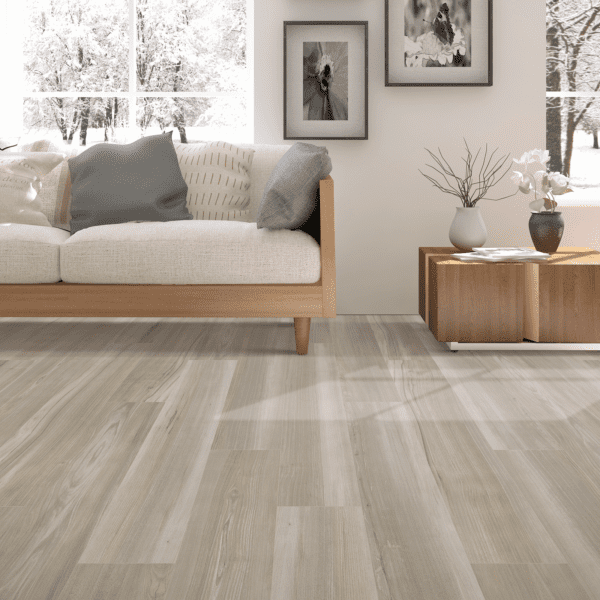 A living room with white walls and wooden floors.