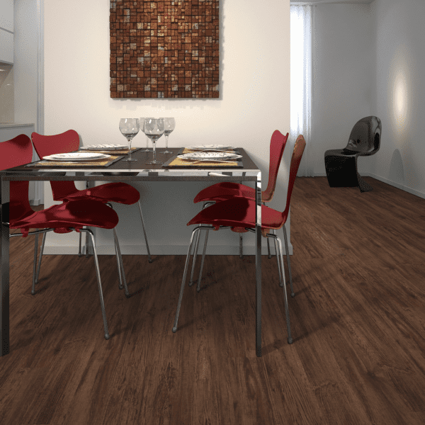 A dining room with red chairs and a table.