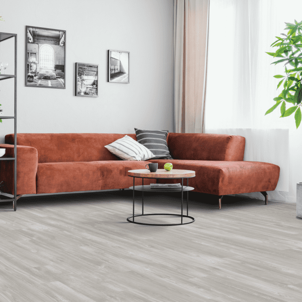 A living room with a couch and coffee table