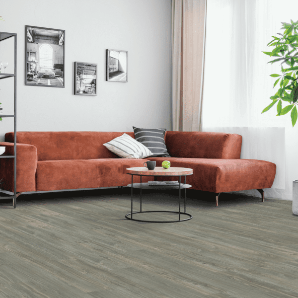A living room with a couch and table