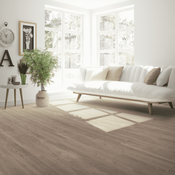 A living room with white furniture and wooden floors.