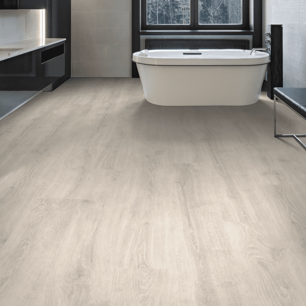 A bathroom with white walls and floors.