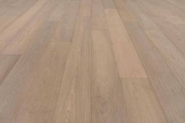 A close up of the wood floor with no one around.