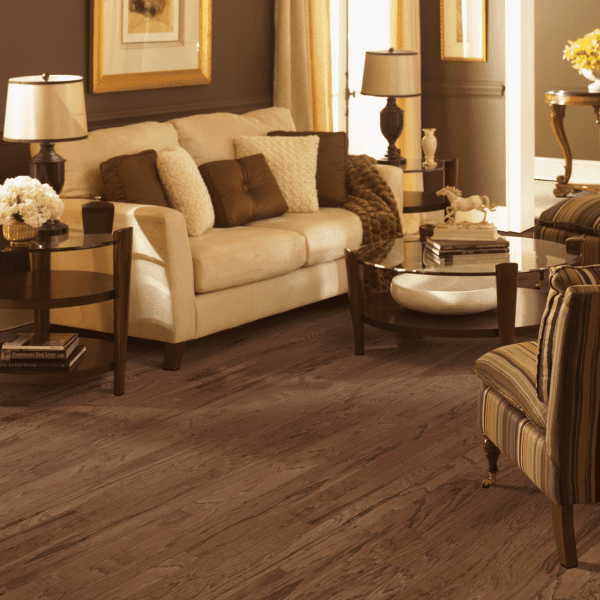 A living room with furniture and lamps on the floor.
