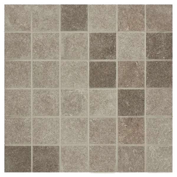 A tile floor with different colors of tiles