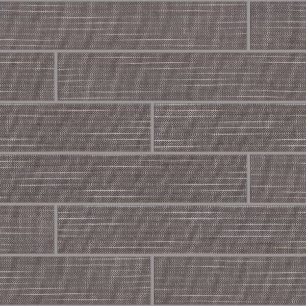A gray tile wall with some white lines