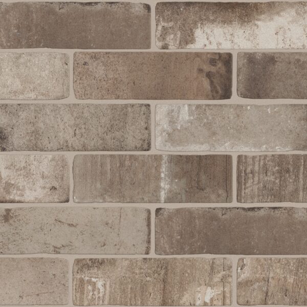 A brick wall with some type of concrete