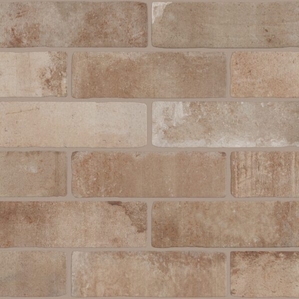 A brick wall with some kind of brown color