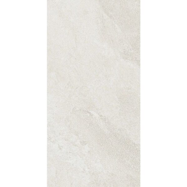 A white tile floor with some type of stone