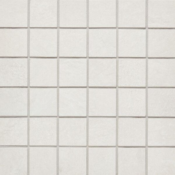 A white tile floor with some small squares
